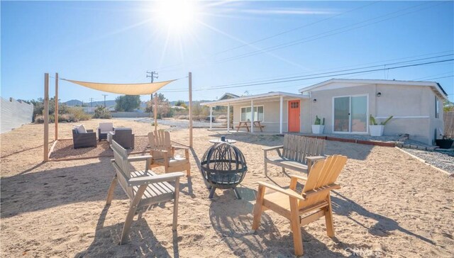 61748 Valley View Cir, Joshua Tree, CA 92252 - view of yard featuring a fire pit and a patio area