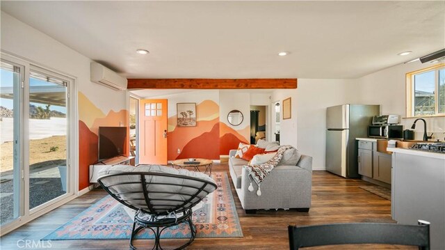 61748 Valley View Cir, Joshua Tree, CA 92252 - living room with an AC wall unit, dark wood-type flooring, beam ceiling, and recessed lighting