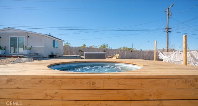 61748 Valley View Cir, Joshua Tree, CA 92252 - view of swimming pool with a hot tub, central AC, and a fenced backyard