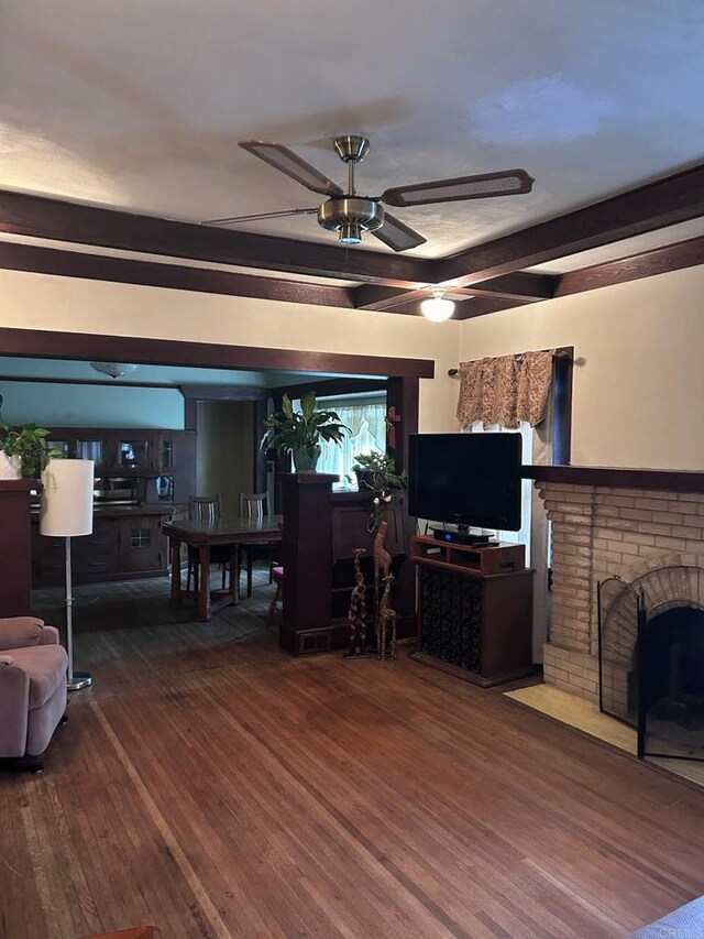 2120 Pine St, San Diego, CA 92103 - living room with wood finished floors, a ceiling fan, a fireplace, and beam ceiling