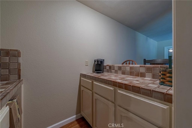 2020 Station Ave, Atwater, CA 95301 - bathroom with baseboards and wood finished floors