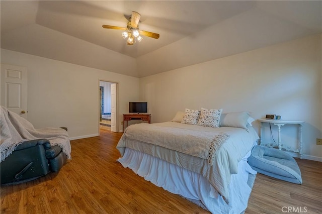 2020 Station Ave, Atwater, CA 95301 - bedroom with wood finished floors, baseboards, vaulted ceiling, and ceiling fan