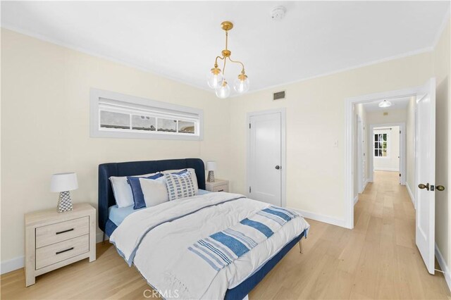 827 Hauser Blvd, Los Angeles, CA 90036 - bedroom featuring light wood-style flooring and baseboards