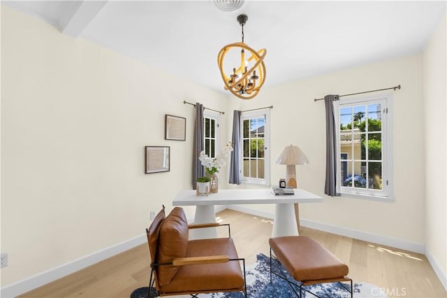 827 Hauser Blvd, Los Angeles, CA 90036 - dining space featuring a chandelier, light wood-style floors, and baseboards