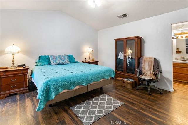 3576 San Jose Ave, Merced, CA 95348 - bedroom with lofted ceiling, wood finished floors, and connected bathroom