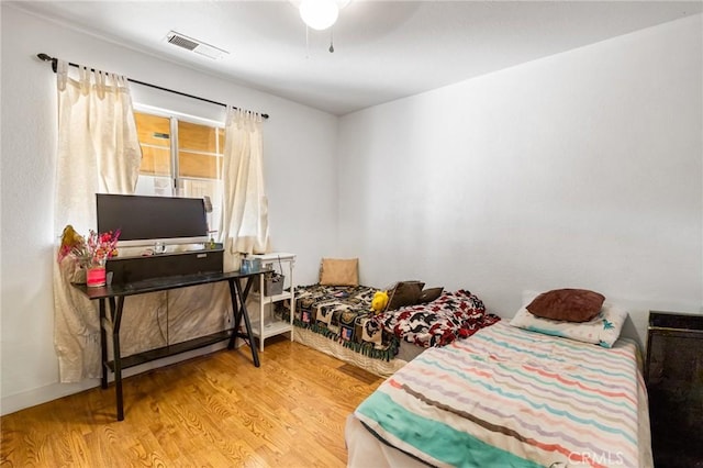 3576 San Jose Ave, Merced, CA 95348 - bedroom with wood finished floors, a ceiling fan, and baseboards