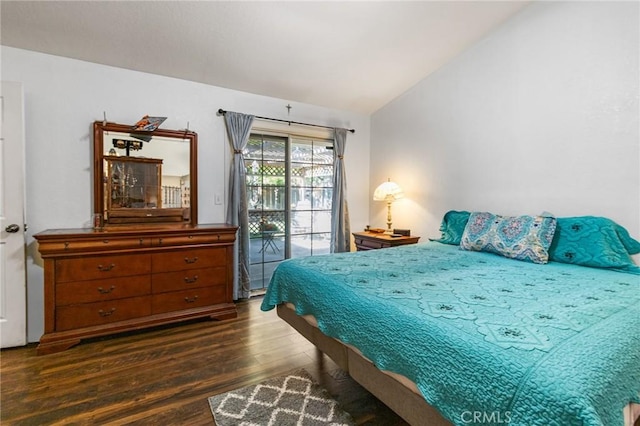 3576 San Jose Ave, Merced, CA 95348 - bedroom with dark wood-type flooring, vaulted ceiling, and access to outside