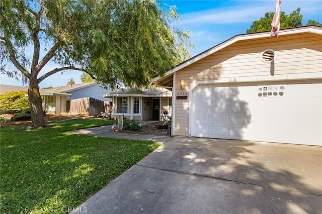 3576 San Jose Ave, Merced, CA 95348 - view of front facade with a garage and driveway