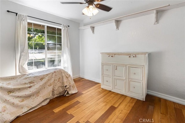 3576 San Jose Ave, Merced, CA 95348 - bedroom with light wood finished floors, baseboards, and ceiling fan