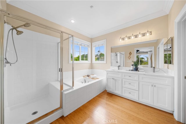 2 Corte Arbertura, San Clemente, CA 92673 - bathroom featuring a stall shower, a bath, double vanity, healthy amount of natural light, and ornamental molding