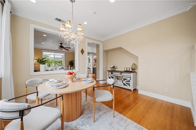 2 Corte Arbertura, San Clemente, CA 92673 - dining room featuring a chandelier, baseboards, recessed lighting, crown molding, and light wood-style floors