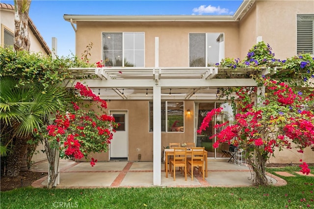 2 Corte Arbertura, San Clemente, CA 92673 - rear view of house featuring stucco siding, a pergola, and a patio