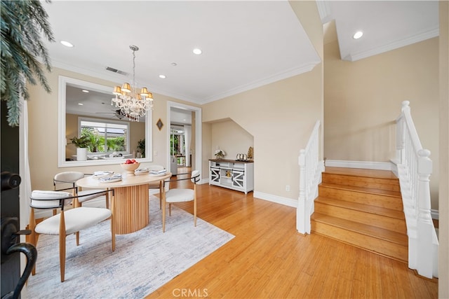 2 Corte Arbertura, San Clemente, CA 92673 - dining room with ornamental molding, stairs, wood finished floors, a chandelier, and baseboards