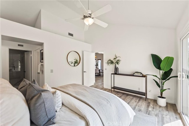 21592 Fernbrook Unit 195, Mission Viejo, CA 92692 - bedroom with wood finished floors, baseboards, high vaulted ceiling, and a ceiling fan
