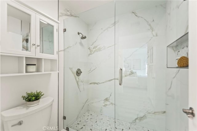 21592 Fernbrook Unit 195, Mission Viejo, CA 92692 - full bathroom featuring toilet and a marble finish shower