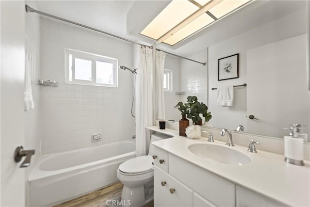 21592 Fernbrook Unit 195, Mission Viejo, CA 92692 - full bathroom featuring toilet, shower / tub combo with curtain, vanity, and wood finished floors
