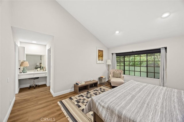 402 El Centro St Unit 13, South Pasadena, CA 91030 - bedroom with wood finished floors, high vaulted ceiling, baseboards, and recessed lighting