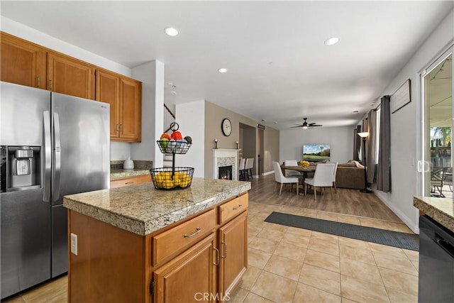 28867 Glencoe Ln, Menifee, CA 92584 - kitchen with stainless steel fridge, tile counters, a ceiling fan, dishwasher, and recessed lighting