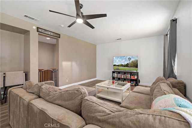 28867 Glencoe Ln, Menifee, CA 92584 - living area featuring a ceiling fan, baseboards, and wood finished floors