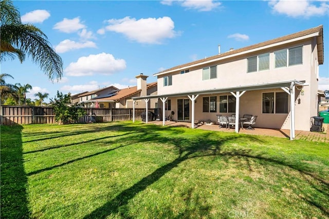 28867 Glencoe Ln, Menifee, CA 92584 - rear view of property featuring stucco siding and a patio