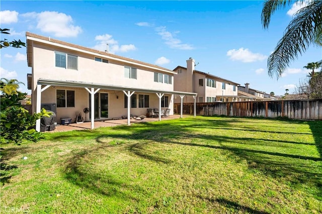 28867 Glencoe Ln, Menifee, CA 92584 - rear view of property with stucco siding and a patio
