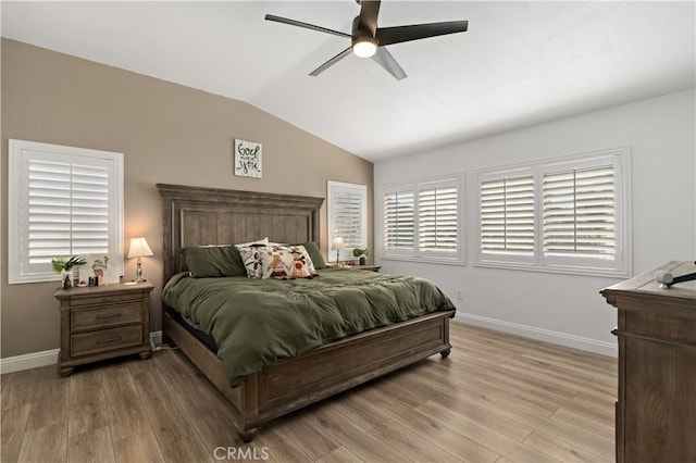 28867 Glencoe Ln, Menifee, CA 92584 - bedroom featuring lofted ceiling, baseboards, light wood-style flooring, and ceiling fan