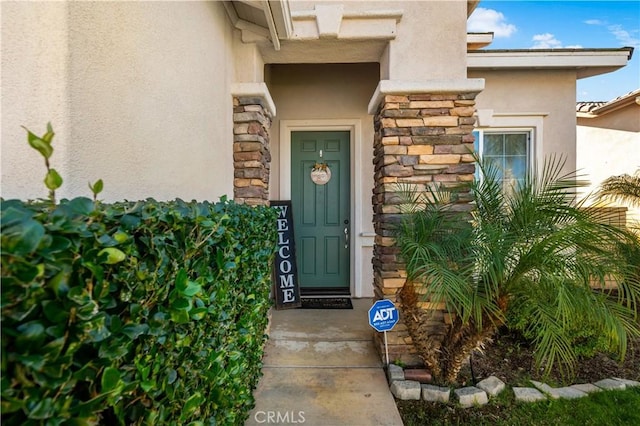 28867 Glencoe Ln, Menifee, CA 92584 - entrance to property featuring stone siding and stucco siding