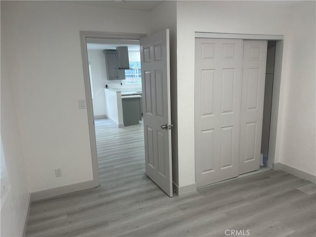 4300 Bancroft Dr, La Mesa, CA 91941 - corridor featuring light wood-style flooring and baseboards