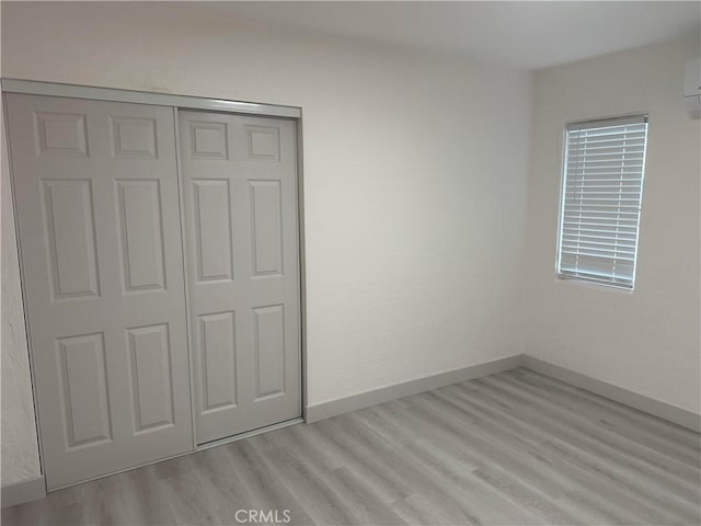 4300 Bancroft Dr, La Mesa, CA 91941 - unfurnished bedroom featuring light wood-style floors, a closet, and baseboards
