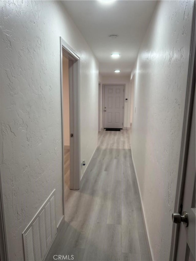 4300 Bancroft Dr, La Mesa, CA 91941 - corridor featuring light wood-style flooring and baseboards