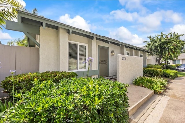 22972 Caminito Linda, Laguna Hills, CA 92653 - view of exterior entry featuring stucco siding