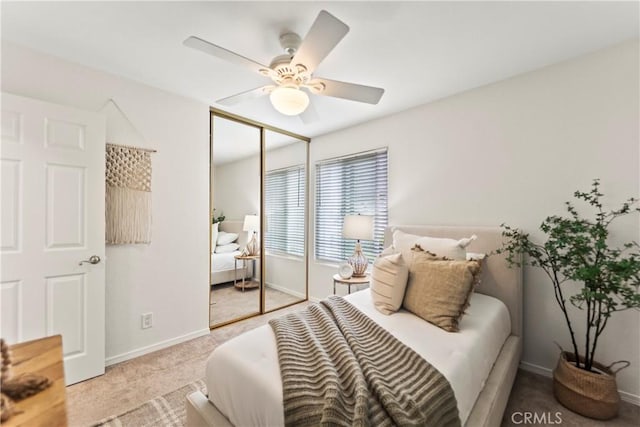 22972 Caminito Linda, Laguna Hills, CA 92653 - bedroom featuring carpet flooring, a closet, baseboards, and a ceiling fan