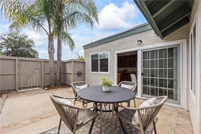22972 Caminito Linda, Laguna Hills, CA 92653 - fenced backyard featuring a patio and outdoor dining area