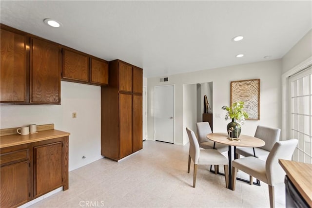 22972 Caminito Linda, Laguna Hills, CA 92653 - dining area with baseboards and recessed lighting