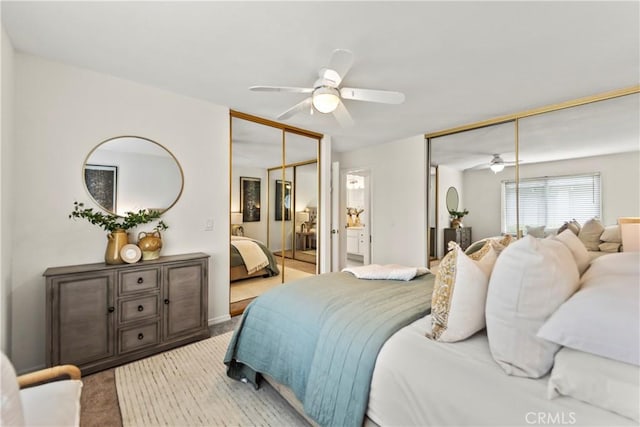 22972 Caminito Linda, Laguna Hills, CA 92653 - bedroom with a ceiling fan, multiple closets, light carpet, and ensuite bath