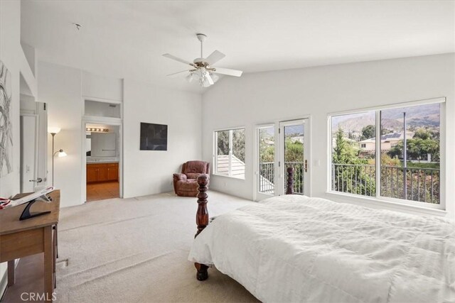 20333 Wynfreed Ln, Porter Ranch, CA 91326 - bedroom featuring carpet flooring, access to outside, multiple windows, lofted ceiling, and connected bathroom