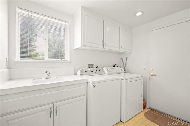 20333 Wynfreed Ln, Porter Ranch, CA 91326 - laundry room featuring cabinet space, washer and dryer, recessed lighting, and light flooring