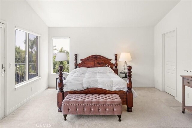 20333 Wynfreed Ln, Porter Ranch, CA 91326 - carpeted bedroom with multiple windows, baseboards, and lofted ceiling