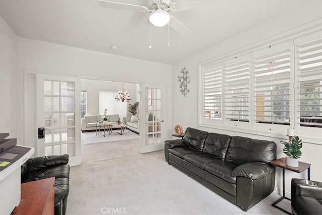 20333 Wynfreed Ln, Porter Ranch, CA 91326 - living area featuring carpet floors, french doors, a chandelier, and a ceiling fan