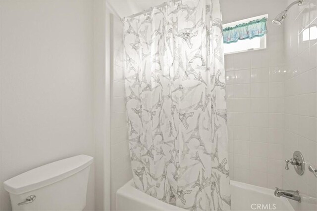 20333 Wynfreed Ln, Porter Ranch, CA 91326 - bathroom with shower / bathtub combination with curtain and toilet