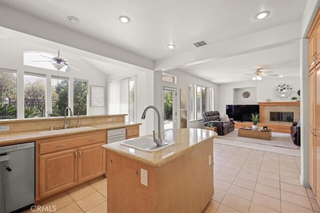 20333 Wynfreed Ln, Porter Ranch, CA 91326 - kitchen featuring stainless steel dishwasher, a sink, a ceiling fan, light tile patterned floors, and recessed lighting