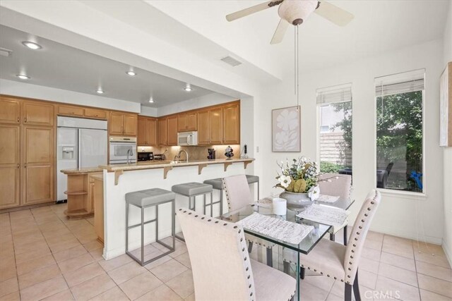20333 Wynfreed Ln, Porter Ranch, CA 91326 - dining room featuring light tile patterned floors, recessed lighting, and ceiling fan