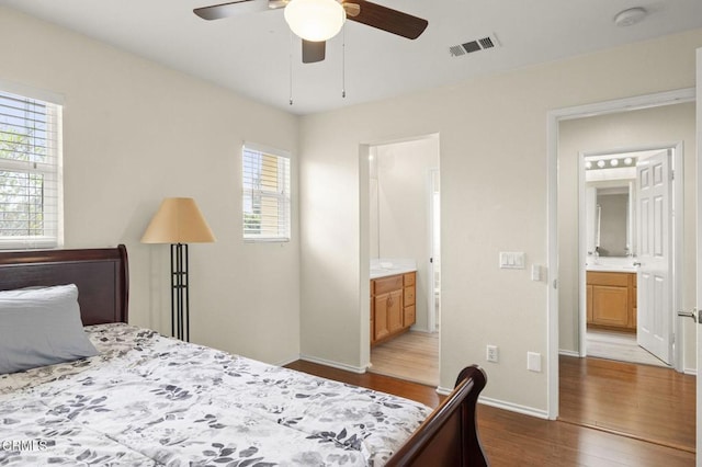 371 Huerta St, Oxnard, CA 93030 - bedroom with wood finished floors, multiple windows, ensuite bath, and a ceiling fan