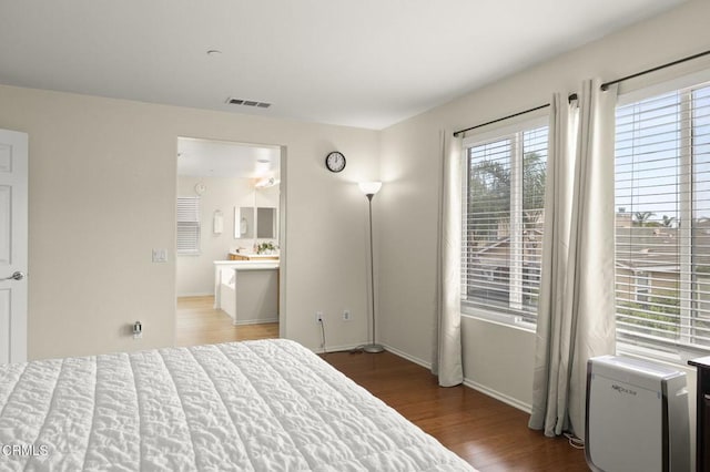 371 Huerta St, Oxnard, CA 93030 - bedroom with wood finished floors and ensuite bathroom