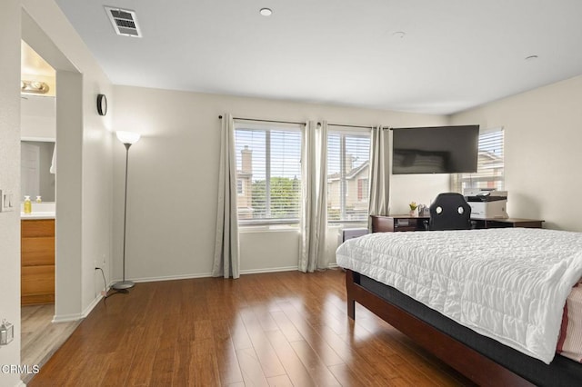 371 Huerta St, Oxnard, CA 93030 - bedroom with multiple windows and wood finished floors