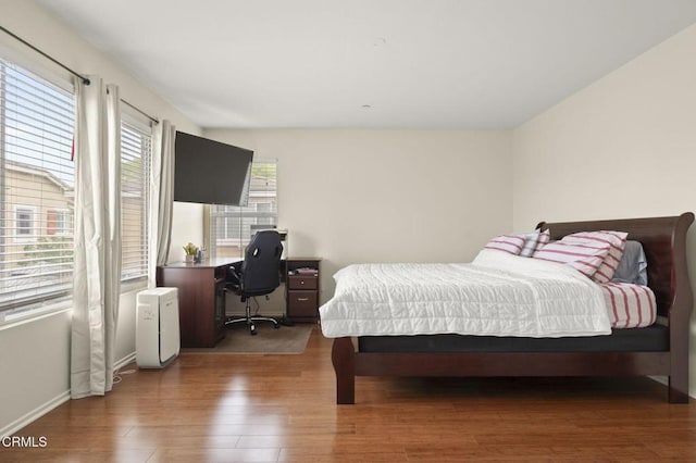 371 Huerta St, Oxnard, CA 93030 - bedroom with wood finished floors and a desk
