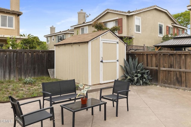 371 Huerta St, Oxnard, CA 93030 - fenced backyard featuring a patio, a storage shed, a gazebo, and an outdoor living space