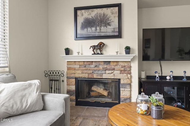 371 Huerta St, Oxnard, CA 93030 - living room featuring a stone fireplace and wood finished floors