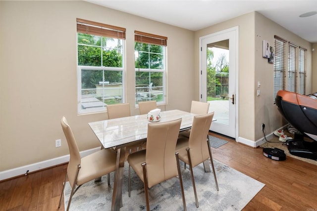 6851 Helenite Pl, Carlsbad, CA 92009 - dining room featuring baseboards and wood finished floors