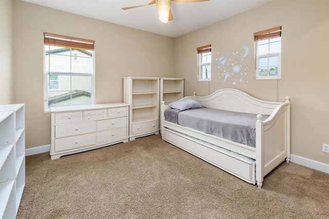 6851 Helenite Pl, Carlsbad, CA 92009 - carpeted bedroom featuring baseboards and ceiling fan